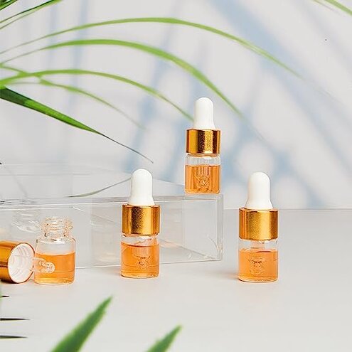 Didaey 200 Pcs Mini Glass Oil Dropper Bottle Bulk, Clear Essential Small Empty Bottles Sample Containers Perfume Liquid Vials with Cap for Traveling (2 ml,Gold)