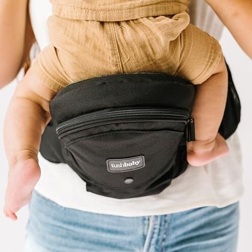 Tushbaby The Original Premium Quality Hip Seat Carrier &ndash; Safety-Certified Baby & Toddler Carrier with Secure Safety Buckles, No-Flimsy-Foam Design, Storage Pockets & Nursing Pillow. 0&ndash;3 yrs